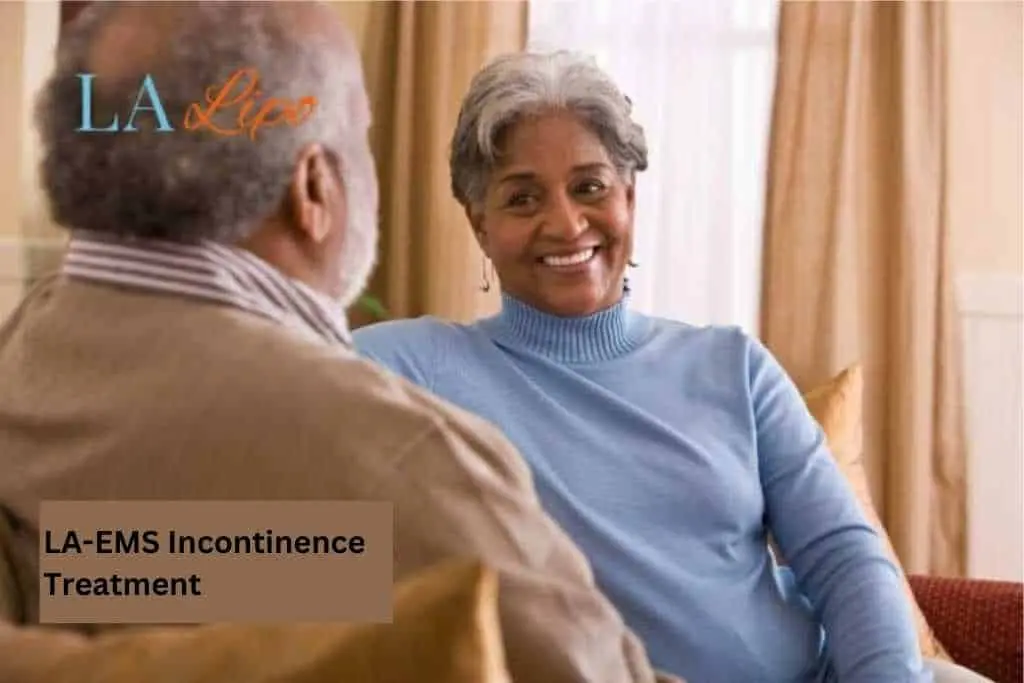 Couple sat smiling at each other - LA-EMS treatment Bury